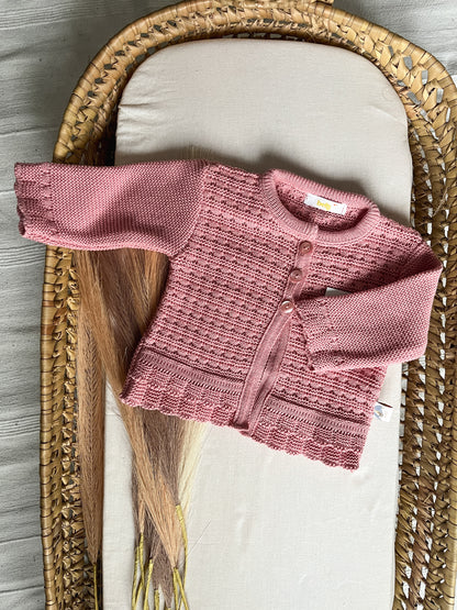 Casaco de malha rosa